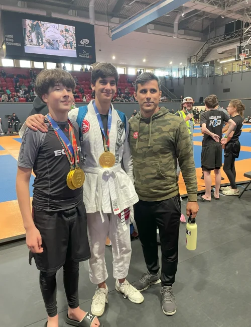 Gracie Barra competitors and coach Marcelo after podium finishes